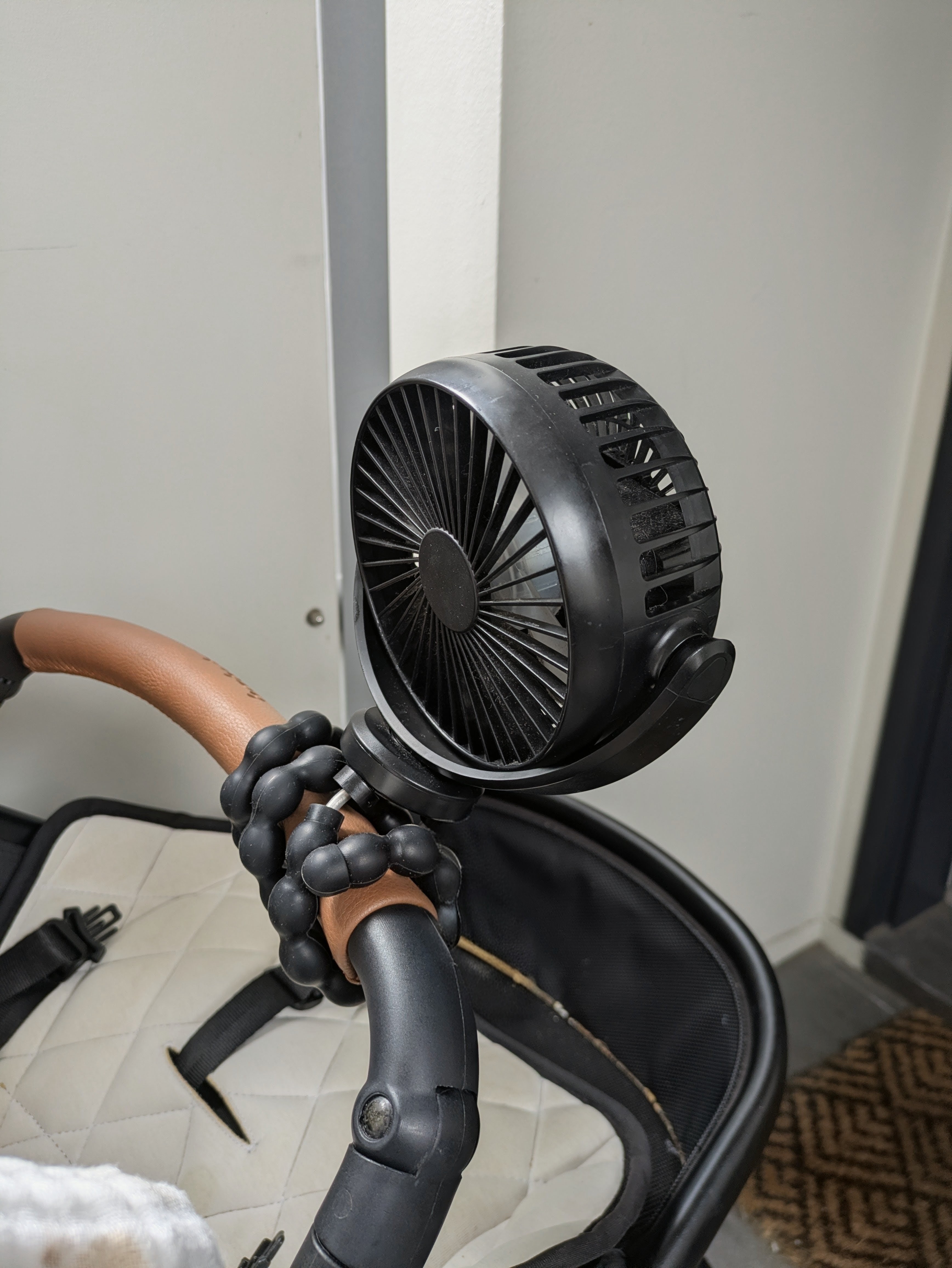 GxerDirect pram fan clipped to our pram handle